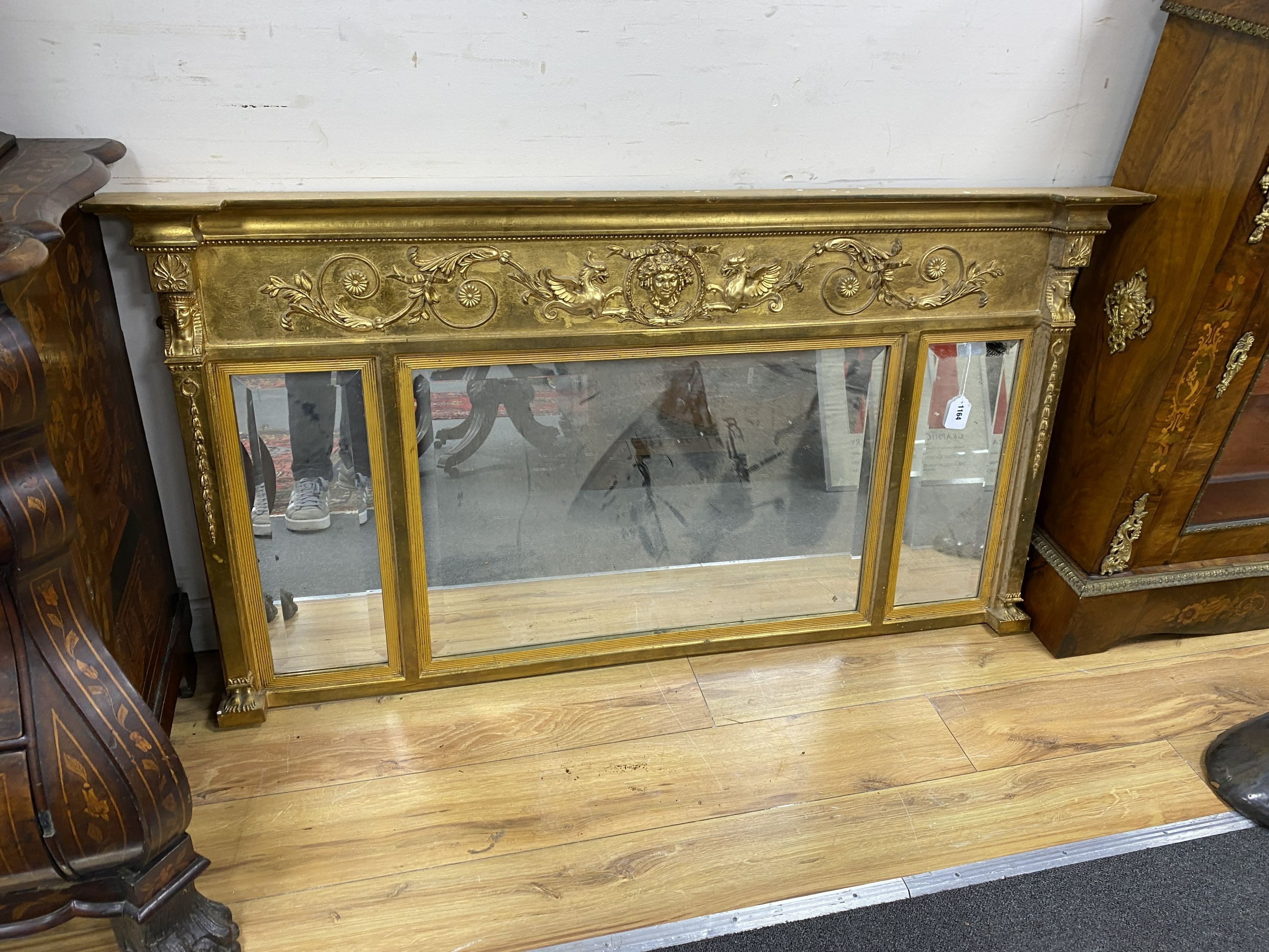 A Regency style gilt frame triple plate overmantel mirror, width 142cm, height 76cm